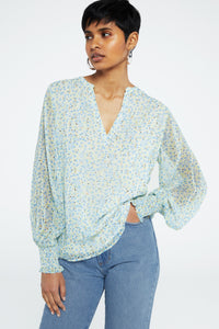 Cliff Ruffle Top | Cream White/Riad Blu