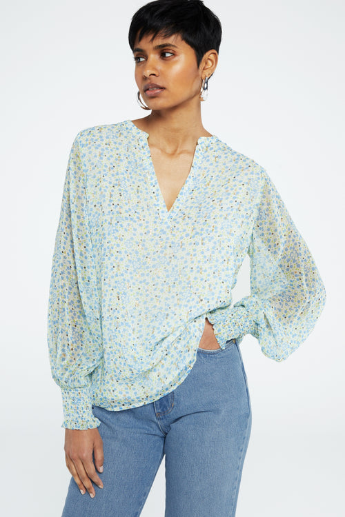 Cliff Ruffle Top | Cream White/Riad Blu