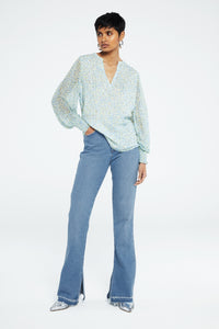 Cliff Ruffle Top | Cream White/Riad Blu